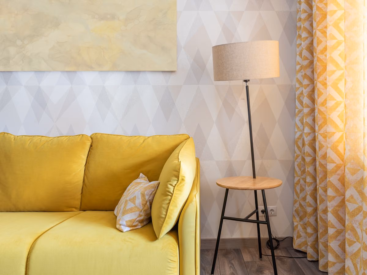 Living room interior with sofa and floor lamp