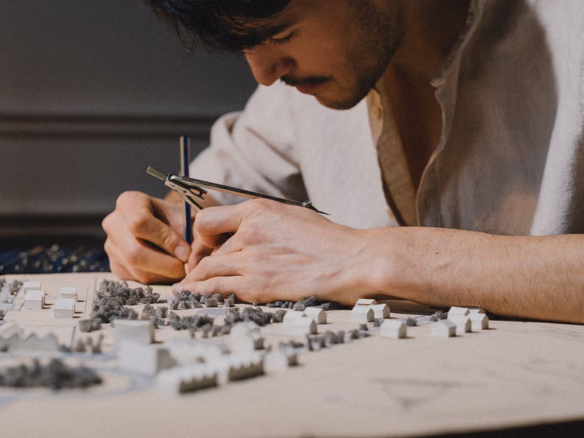 Architect working on a physical model for reference