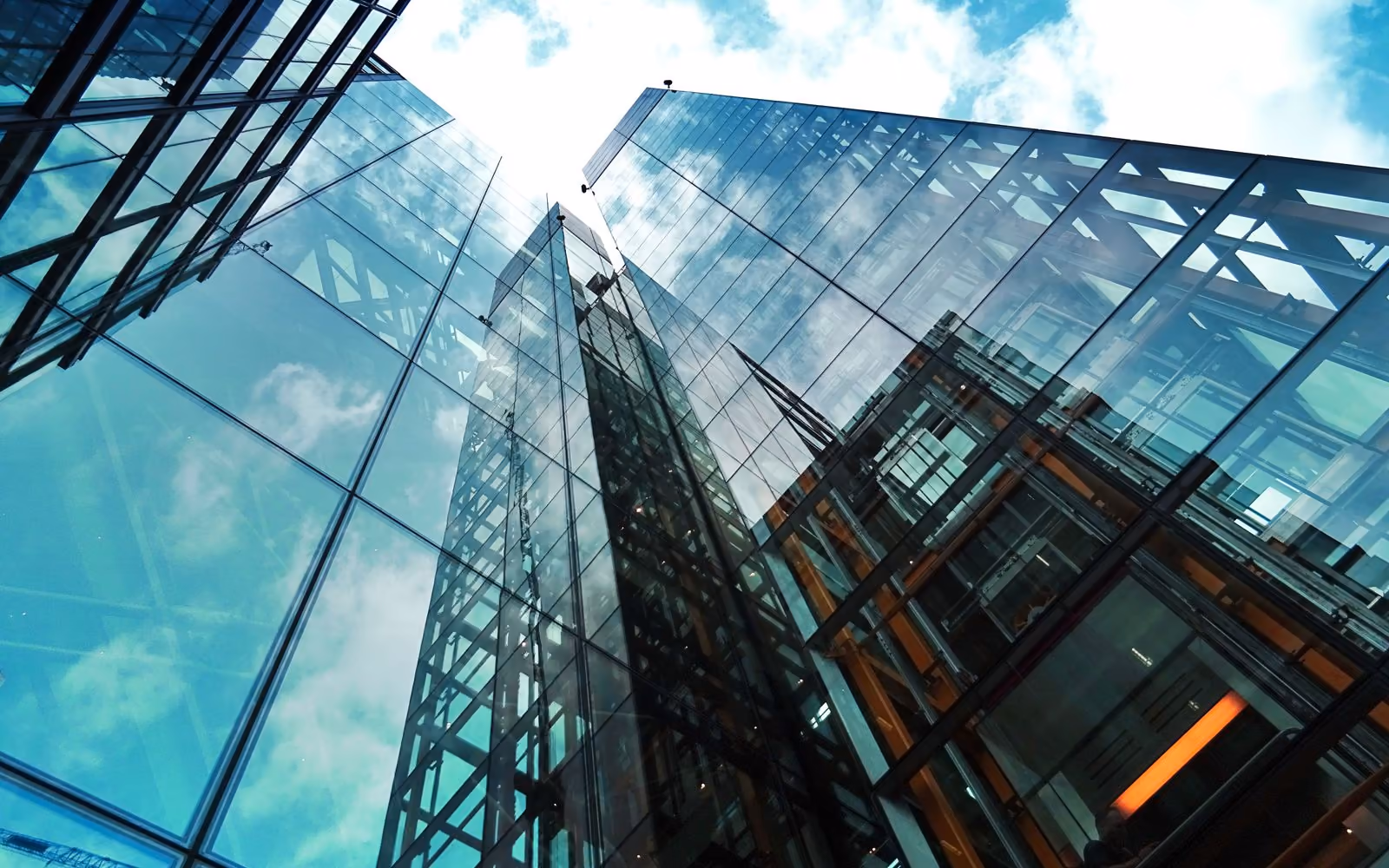Glass facade reflections (placeholder photo)